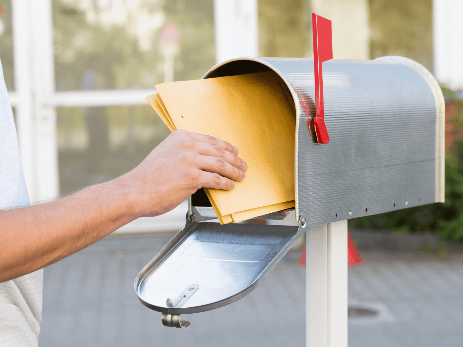 Postcard direct mail pieces on a desk